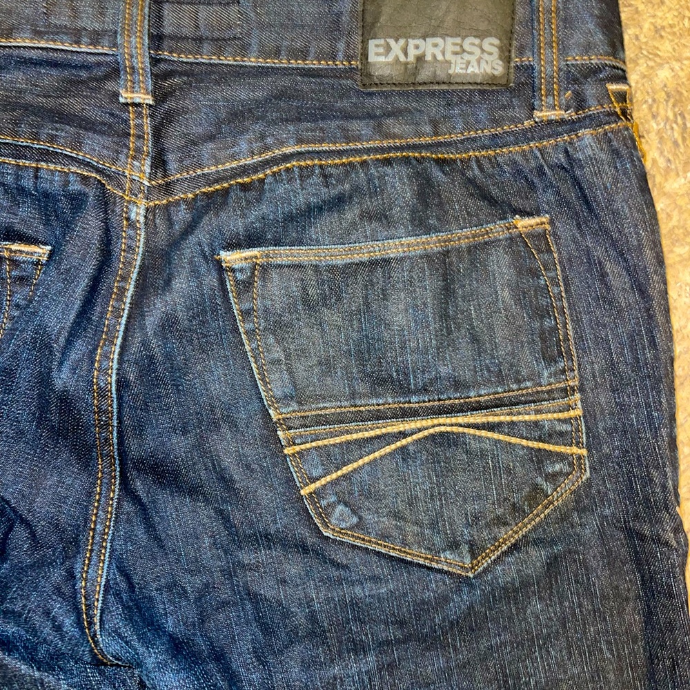 Express Rocco slim fit skinny leg dark jeans.